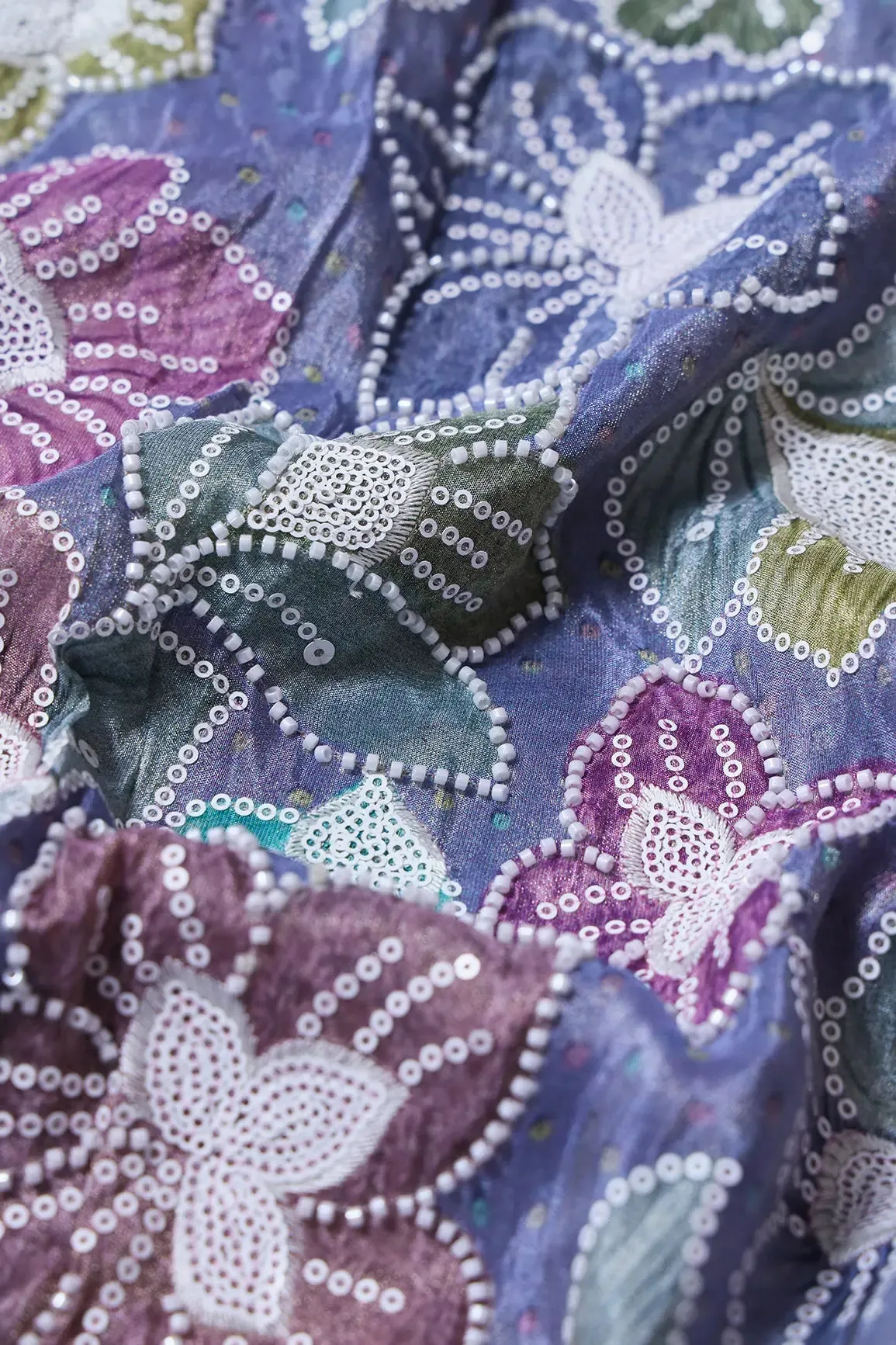 Floral Position Print With White Beads And White Sequins Embroidery On Lilac Viscose Zari Tissue Fabric