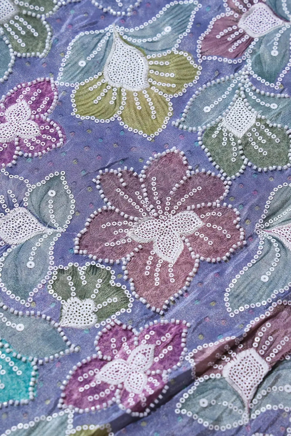 Floral Position Print With White Beads And White Sequins Embroidery On Lilac Viscose Zari Tissue Fabric