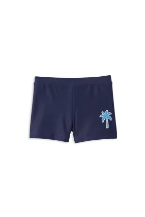 MILKY NAVY SWIM SHORT